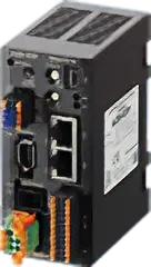 産業用制御機器の背面パネル。複数の通信ポート（Ethernet、USB、シリアル）や端子台が備わっている。